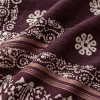 plum batik saree texture close up plum batik saree texture close up