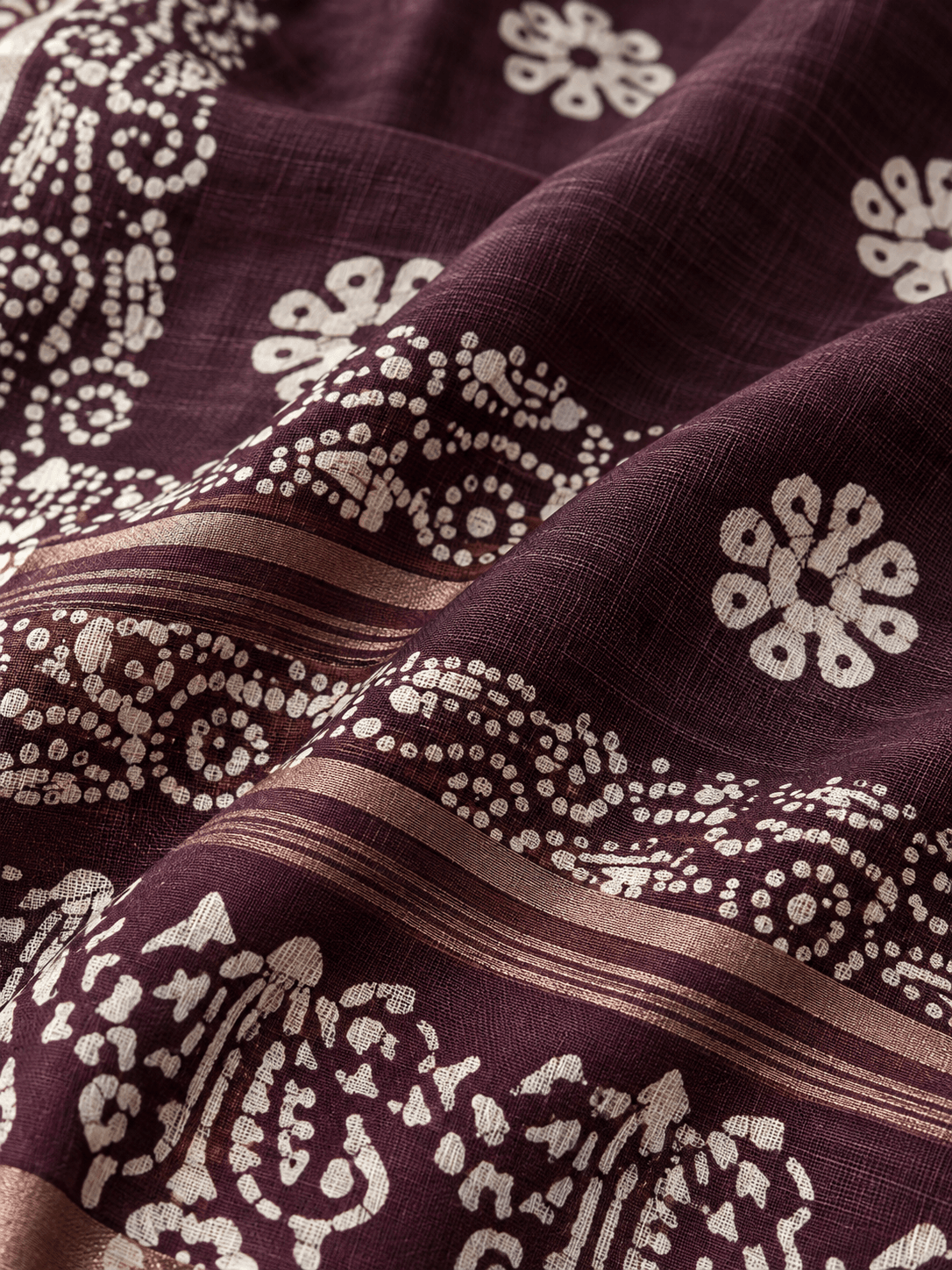 plum batik saree texture close up plum batik saree texture close up
