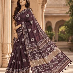 plum saree in a heritage courtyard